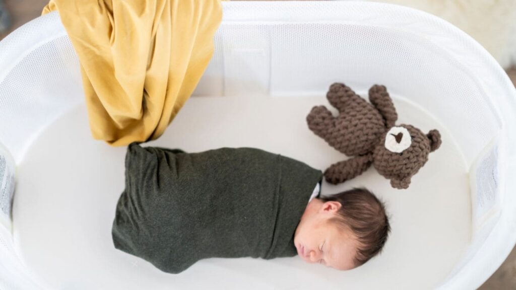 Newborn Rolling to Side in Bassinet 3