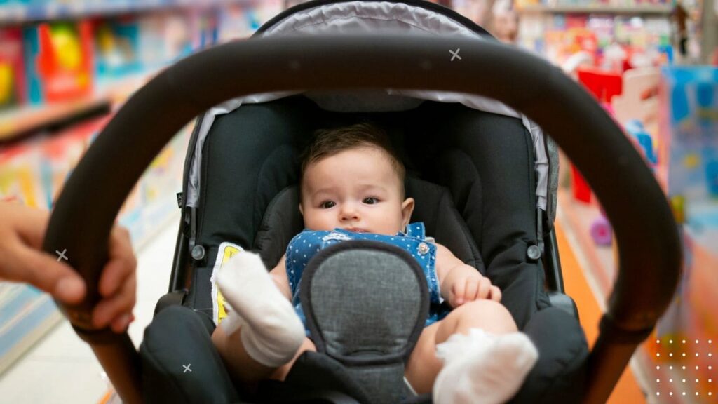 How to put a car seat on a shopping cart 4