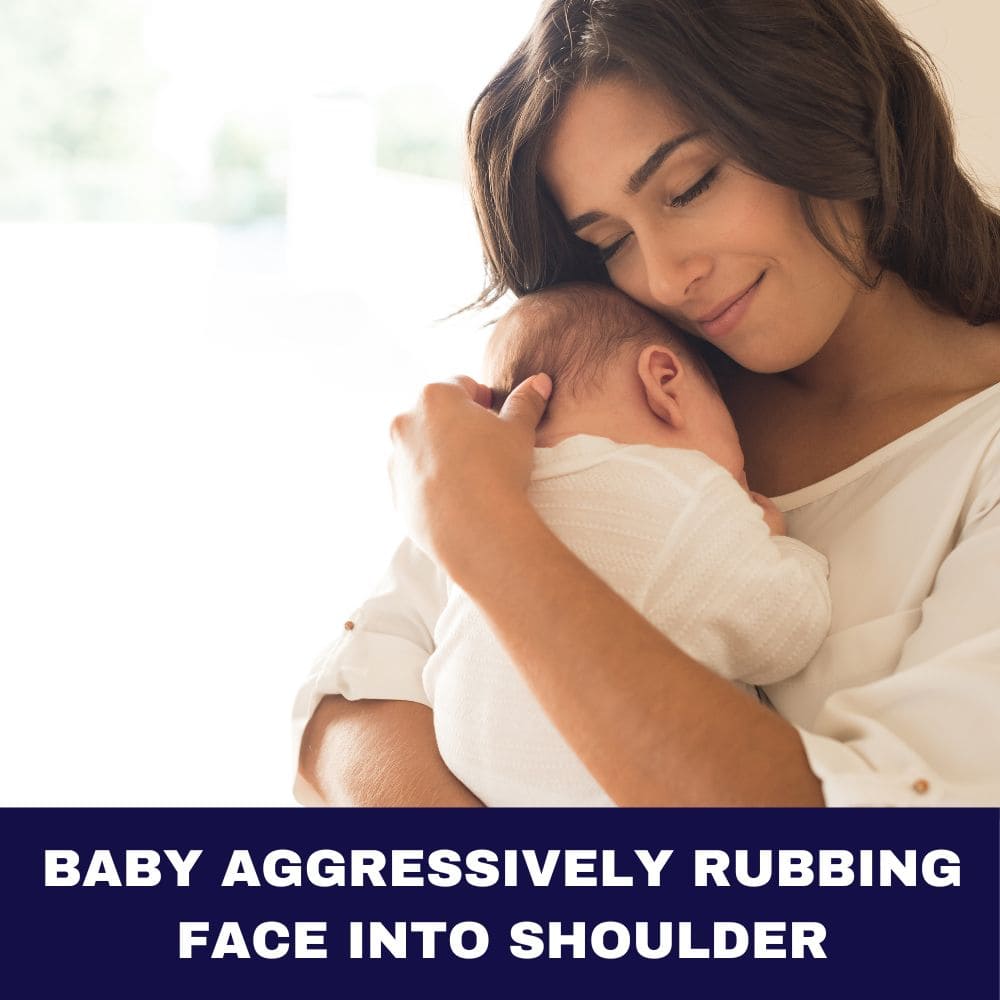Baby Aggressively Rubbing Face Into Shoulder
